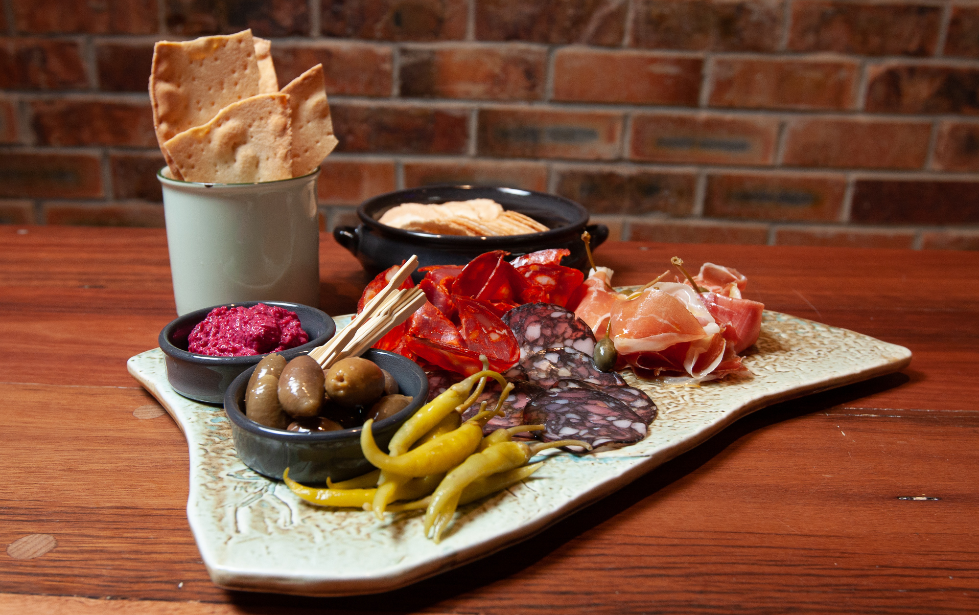 Charcuterie with meats, dips and pepperselmatadorspanishtapasbrisbanenewopening Hidden